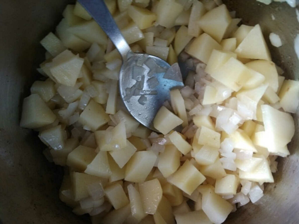 add chopped potatoes to sauteed onions
