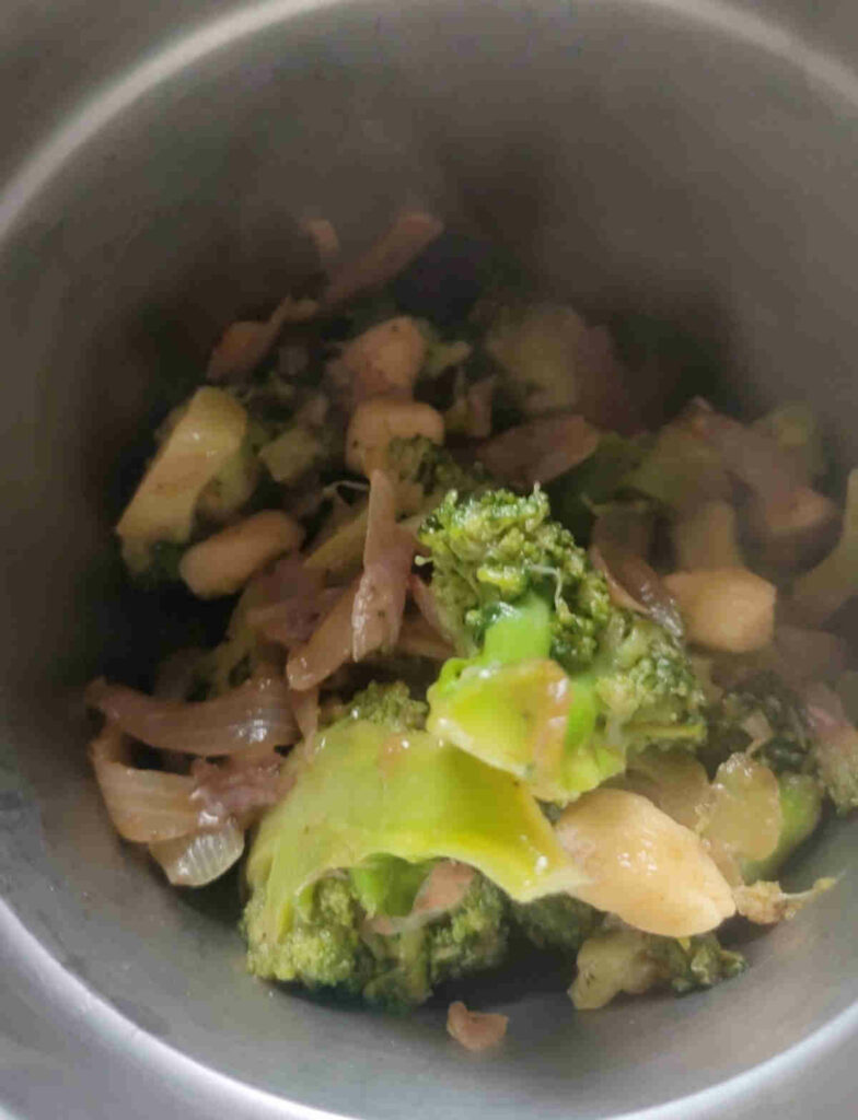 add cooked broccoli almond to the blender