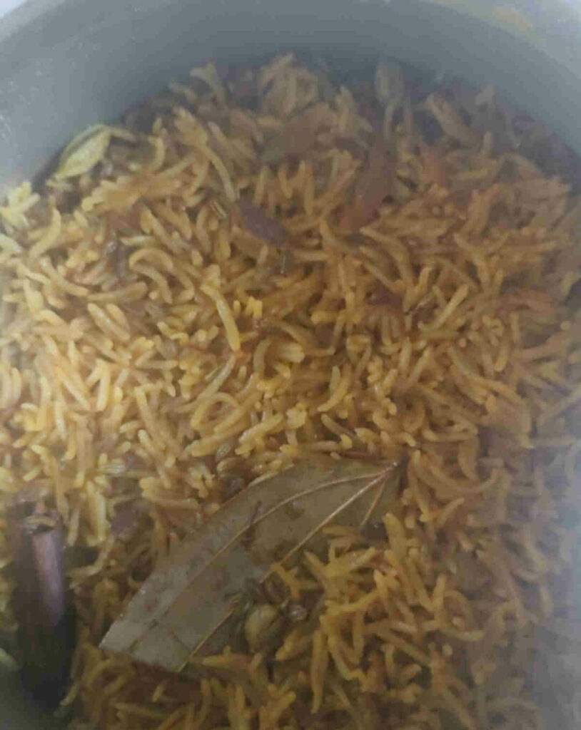 cooked jaggery rice in pressure cooker