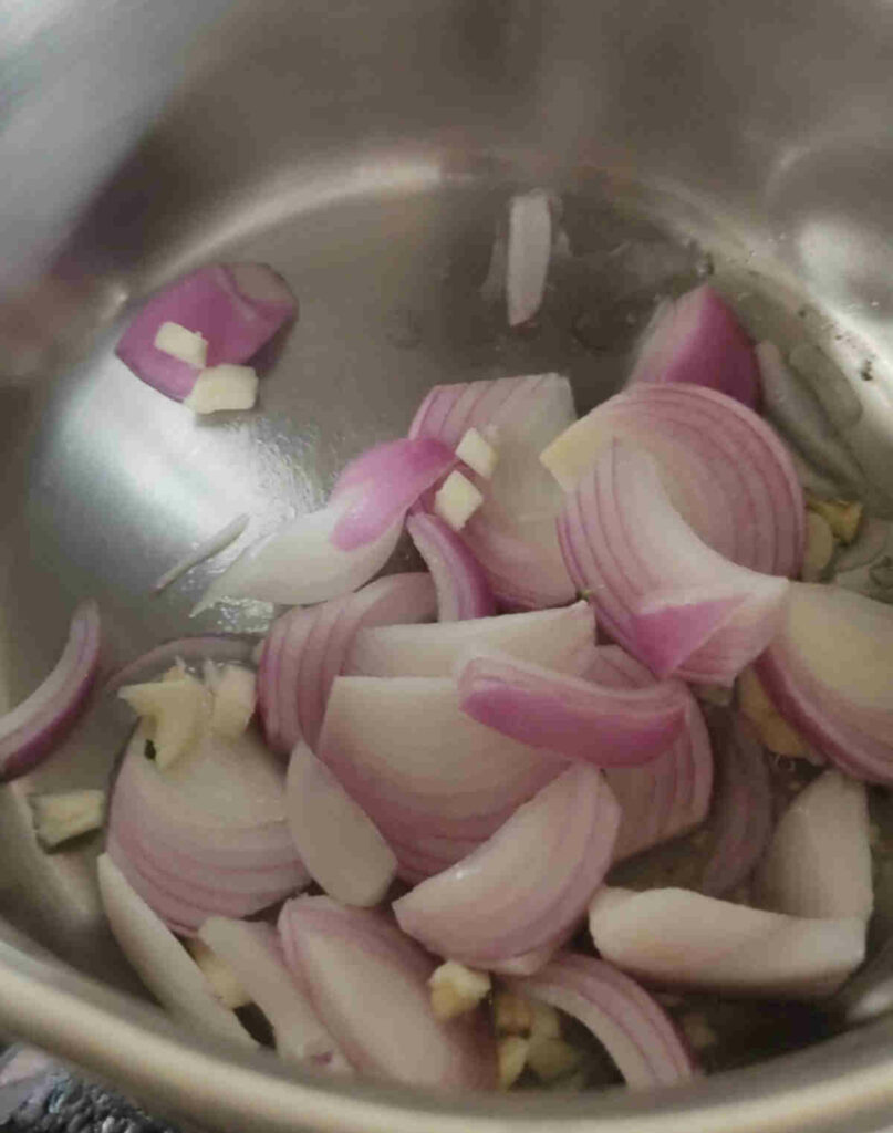 add chopped onions garlic to hot olive oil