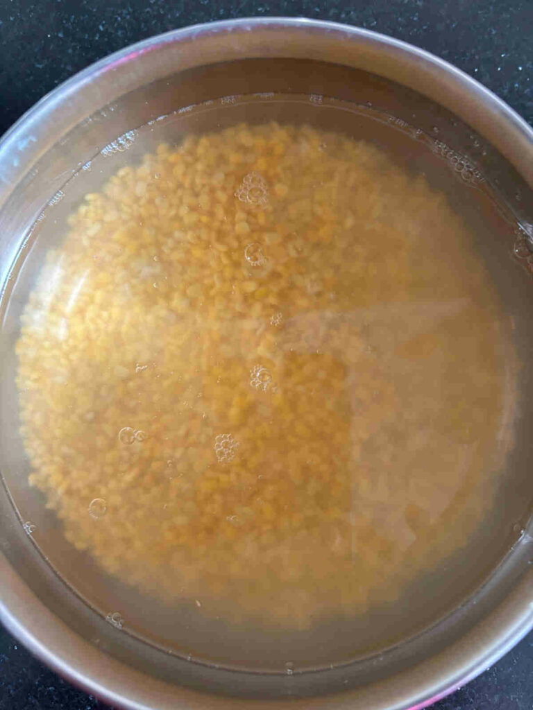 washed and soaked moong dal yellow lentil
