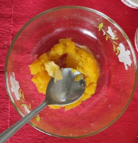 mixing pumpkin puree, sugar butter in a bowl