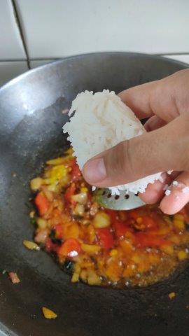 add rice to sauteed veggies