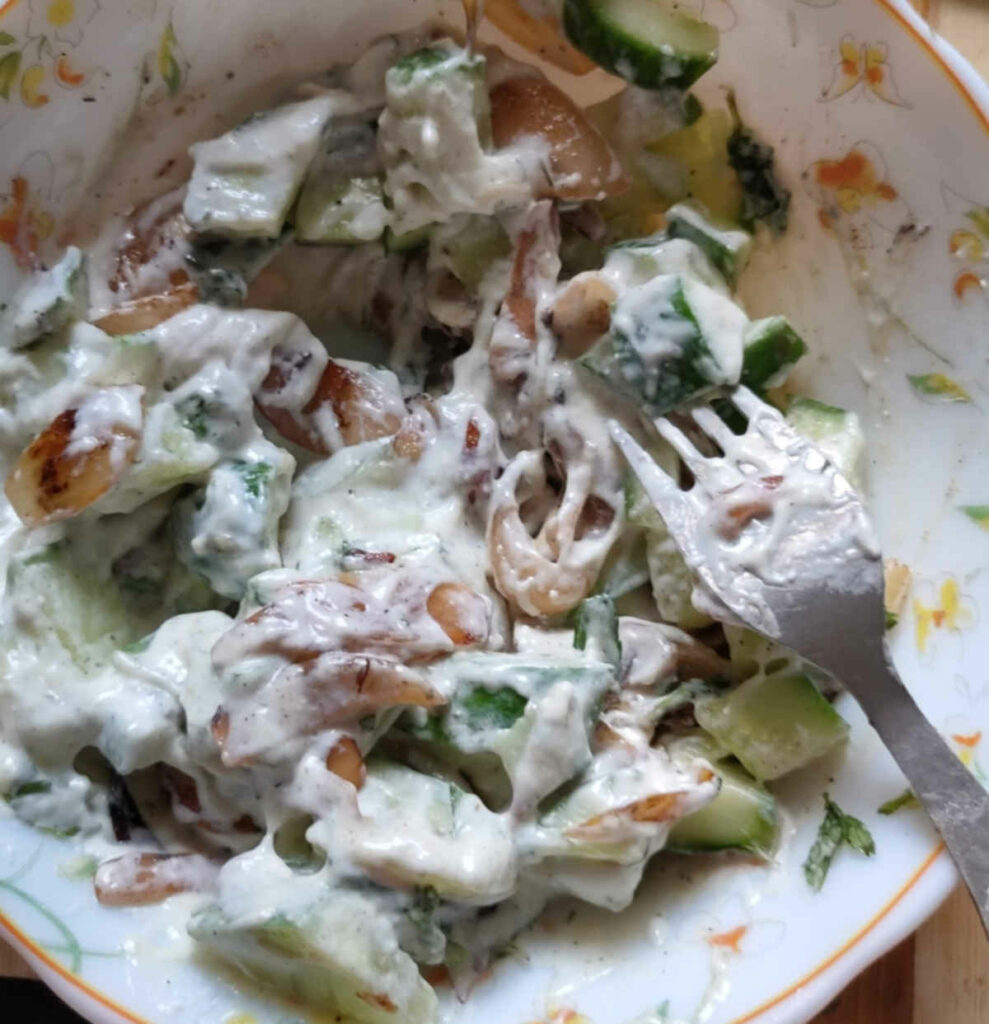 mix everything well for cucumber onion salad in bowl