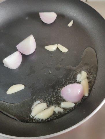 add onions in ghee with garlic