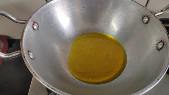 heat mustard oil for making achar