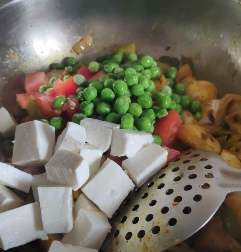 add paneer, peas, tomatoes to mushrooms
