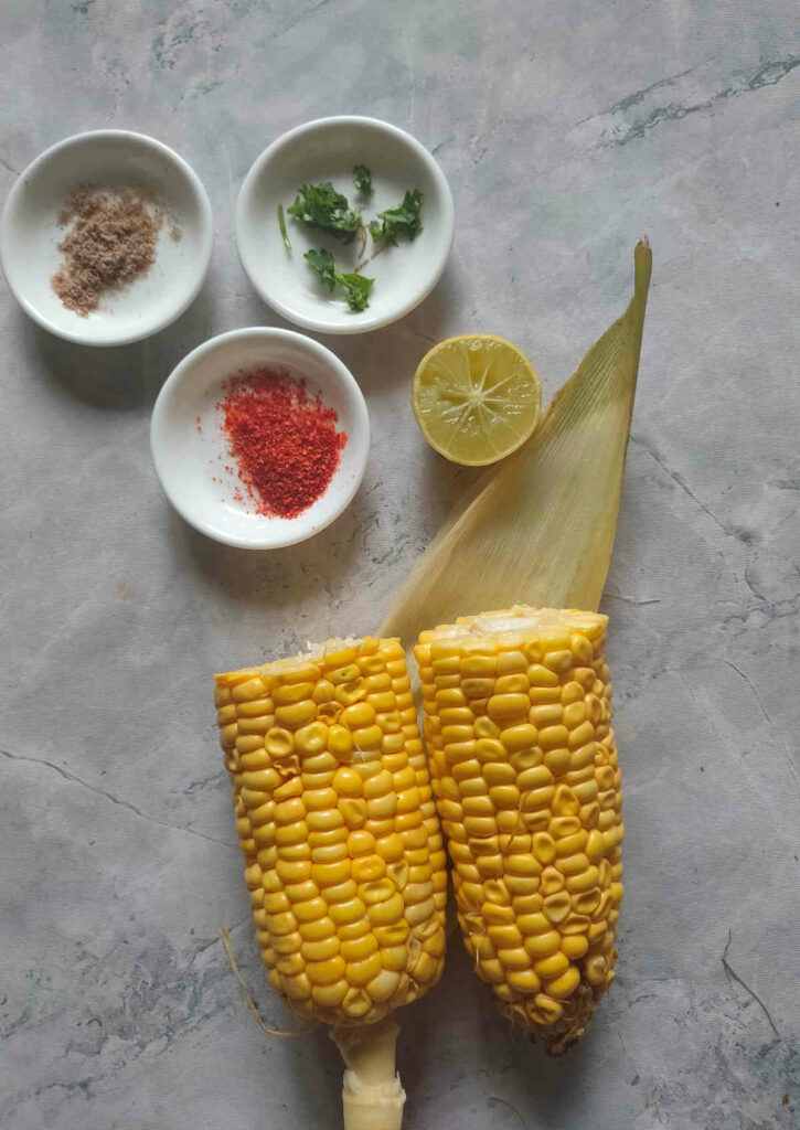 break corn on cob into parts to fit in an air fryer basket