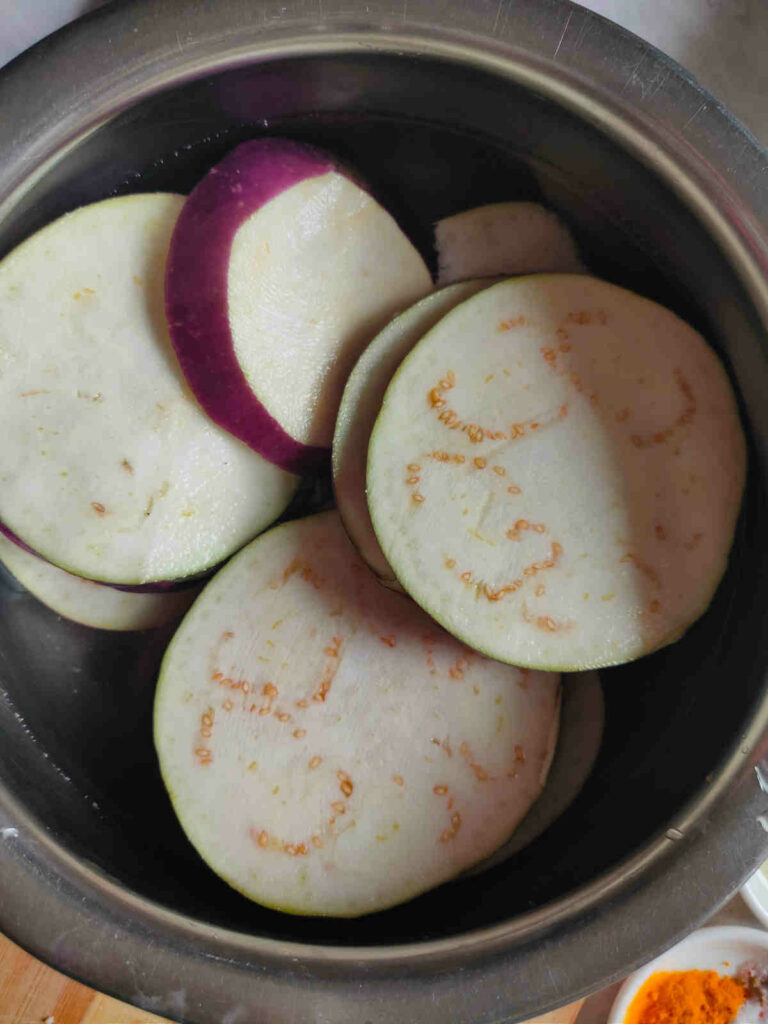 eggplant slices washed before adding to gram flour batter