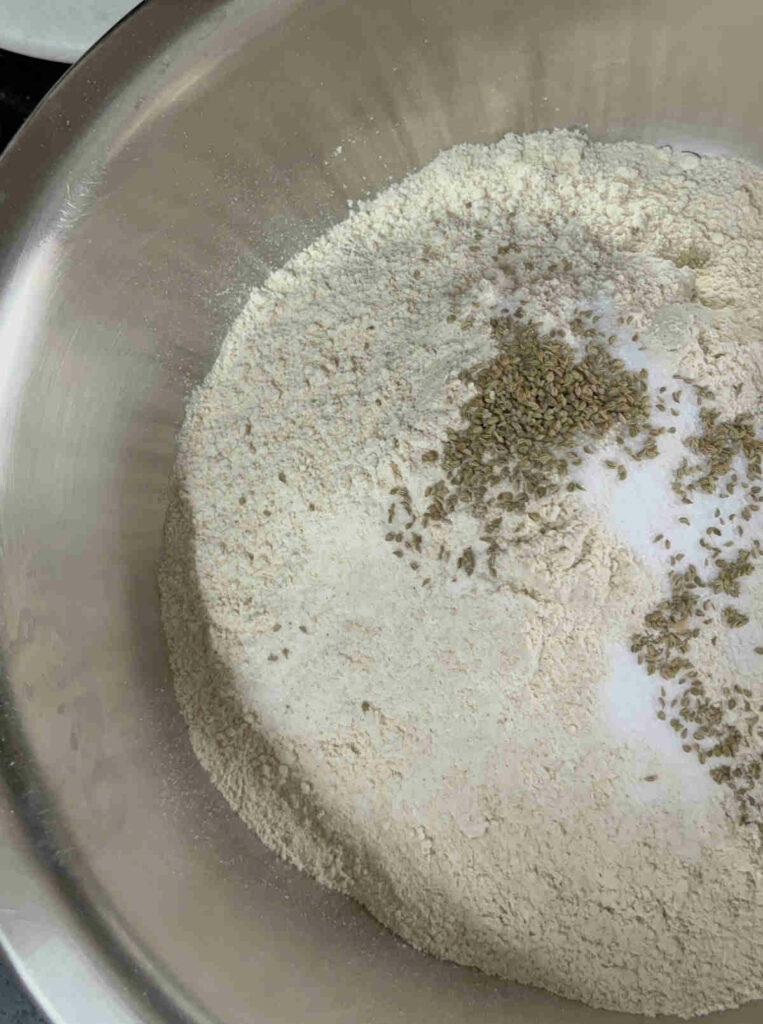 add salt ajwain to wheat flour for kneading poori dough
