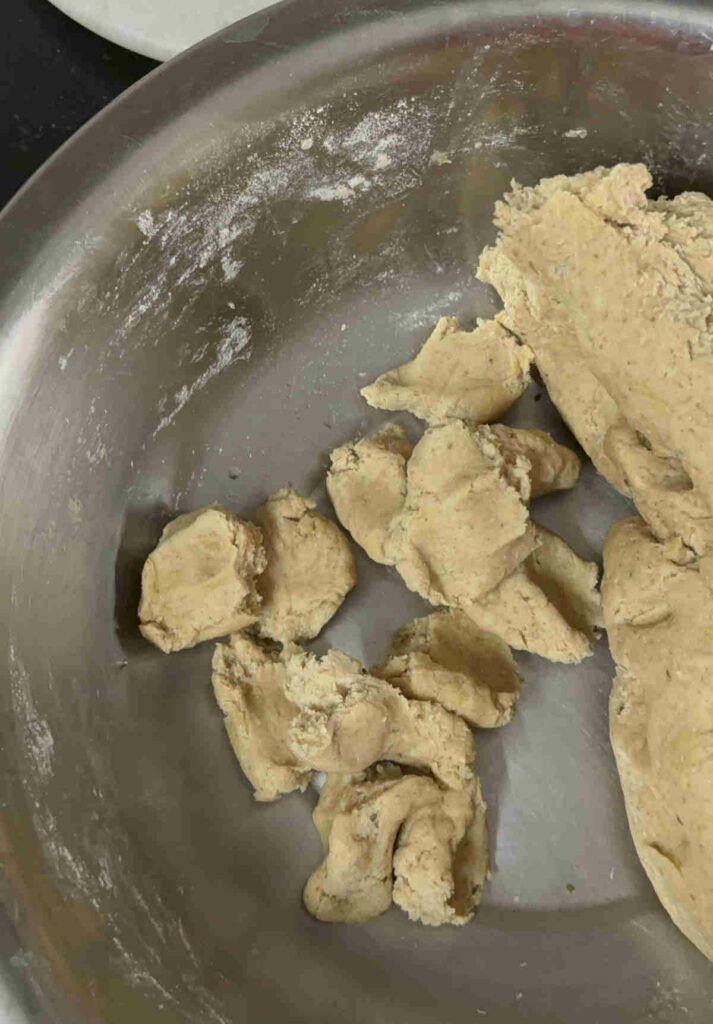 break dough into small parts