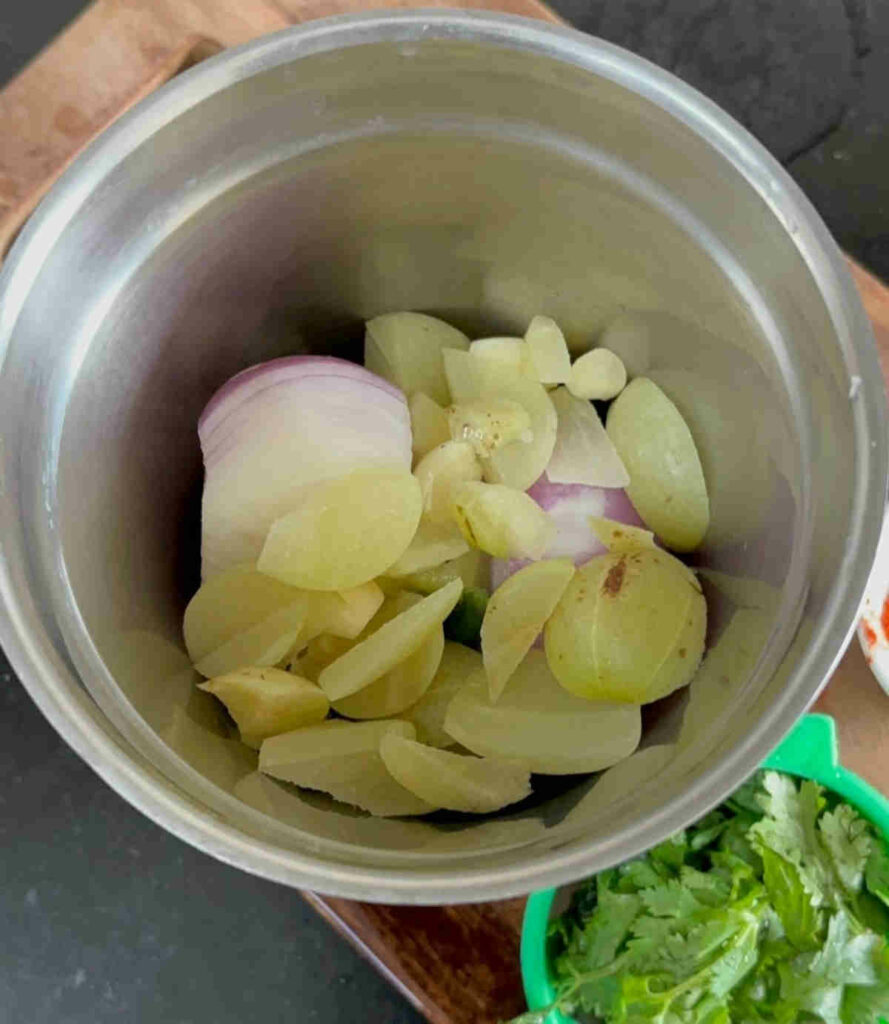 add chopped amla and onion for making chutney